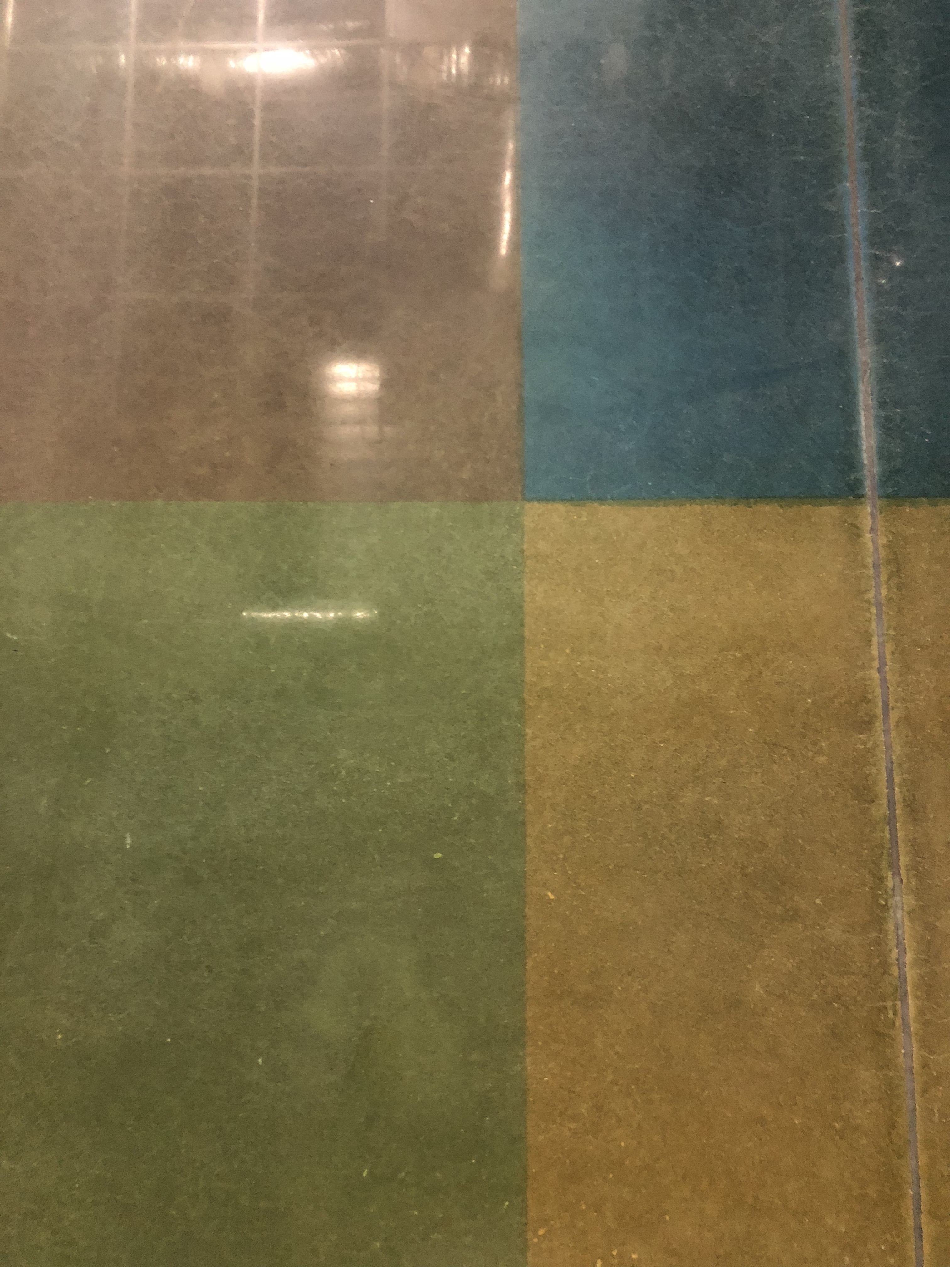 A gorgeous pattern for red, green, blue, and yellow polished concrete.